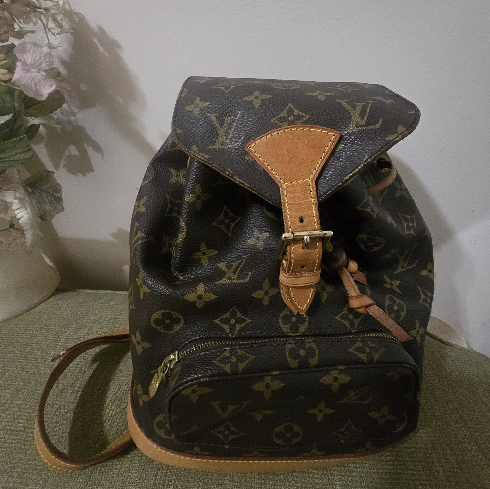 Authentic Louis Vuitton Signature Montsouris MM Backpack - One Owner.